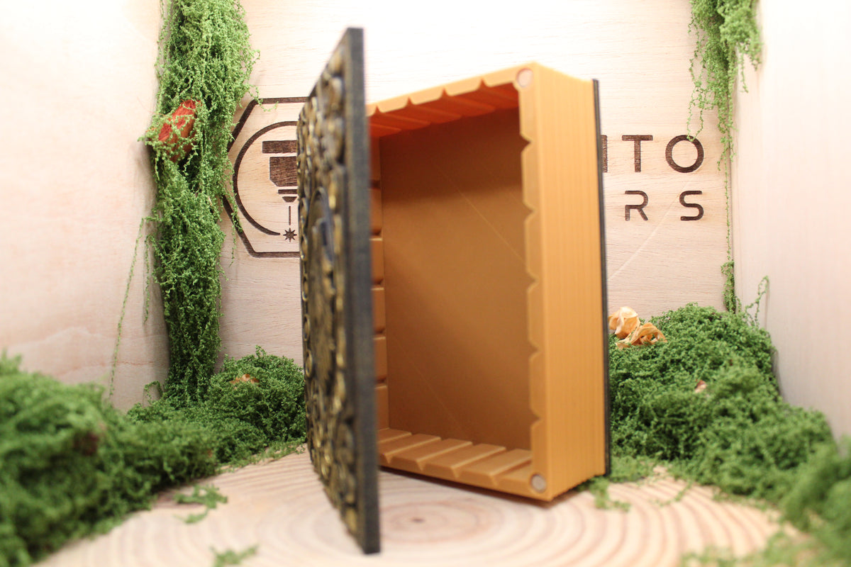 Caja secreta libro abierta con interior de un compartimento a juego con el acabado dorado