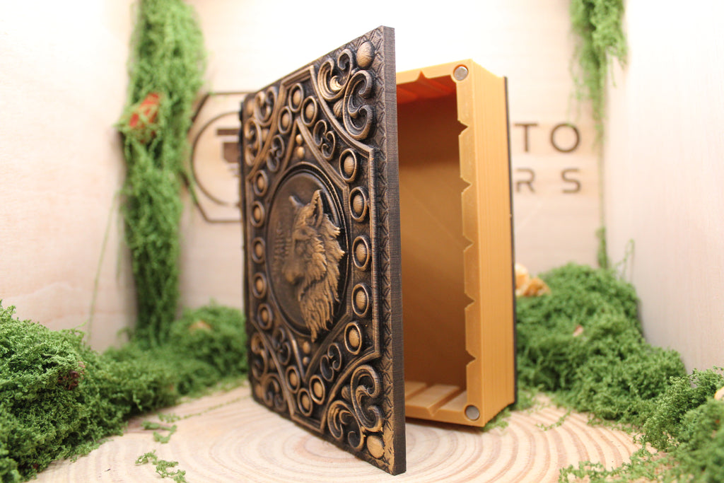 Caja secreta del lobo abierta en acabado bronce, con el interior a juego y las guías de las divisiones