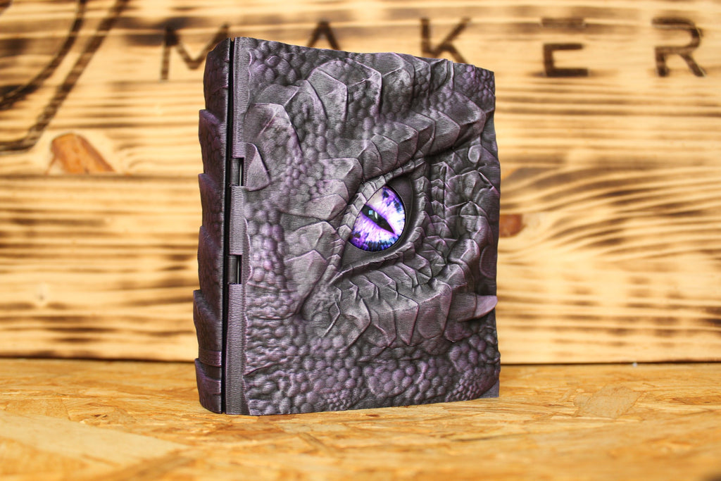 Caja secreta El Ojo del Cuélebre en morado, con un ojo de dragón morado